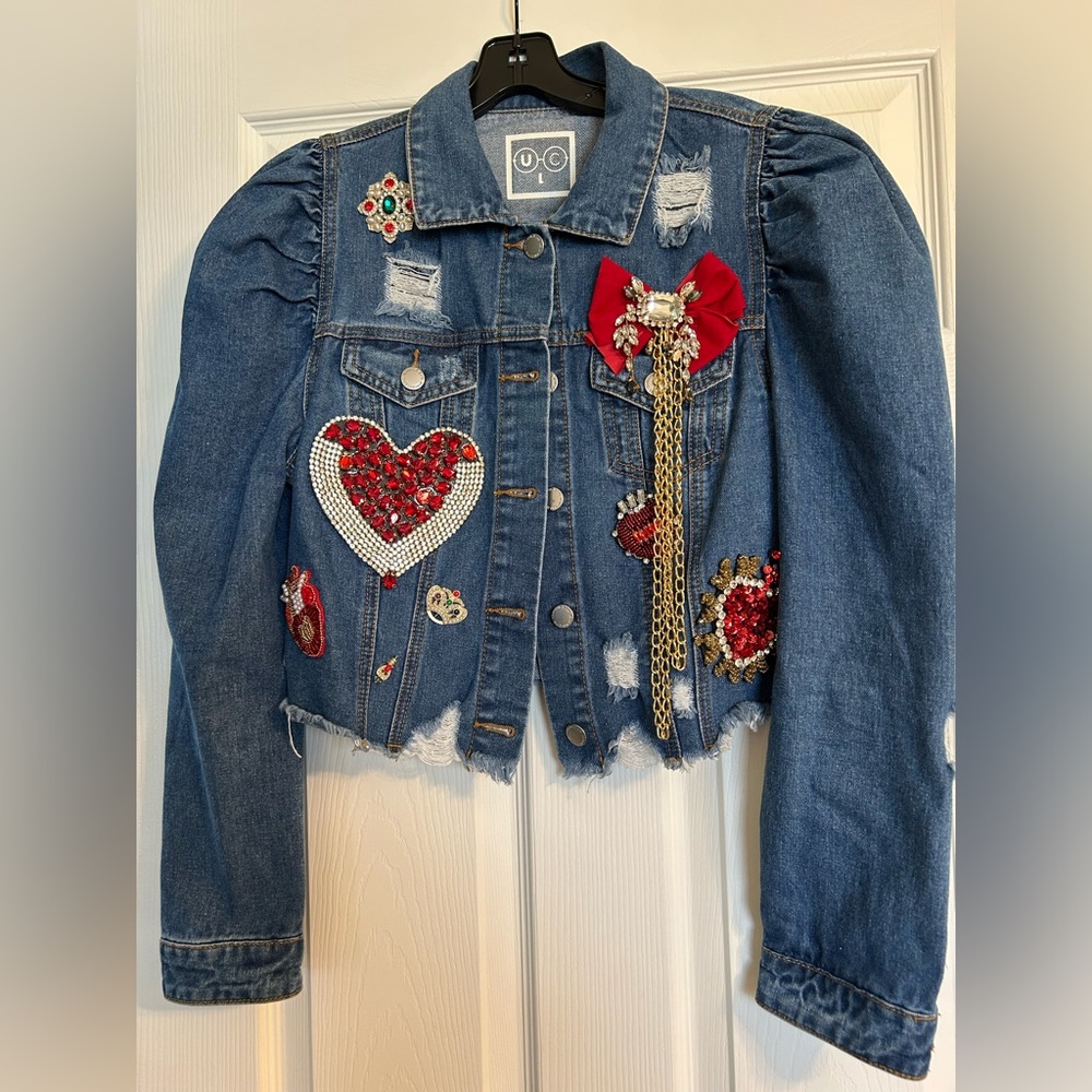 Super cute denim jacket with heart shaped embroidery and gold embellishments